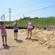 Alexis Walsh, Alex March, Erica Svendsen, and Asli Sezen-Barrie measuring sea level